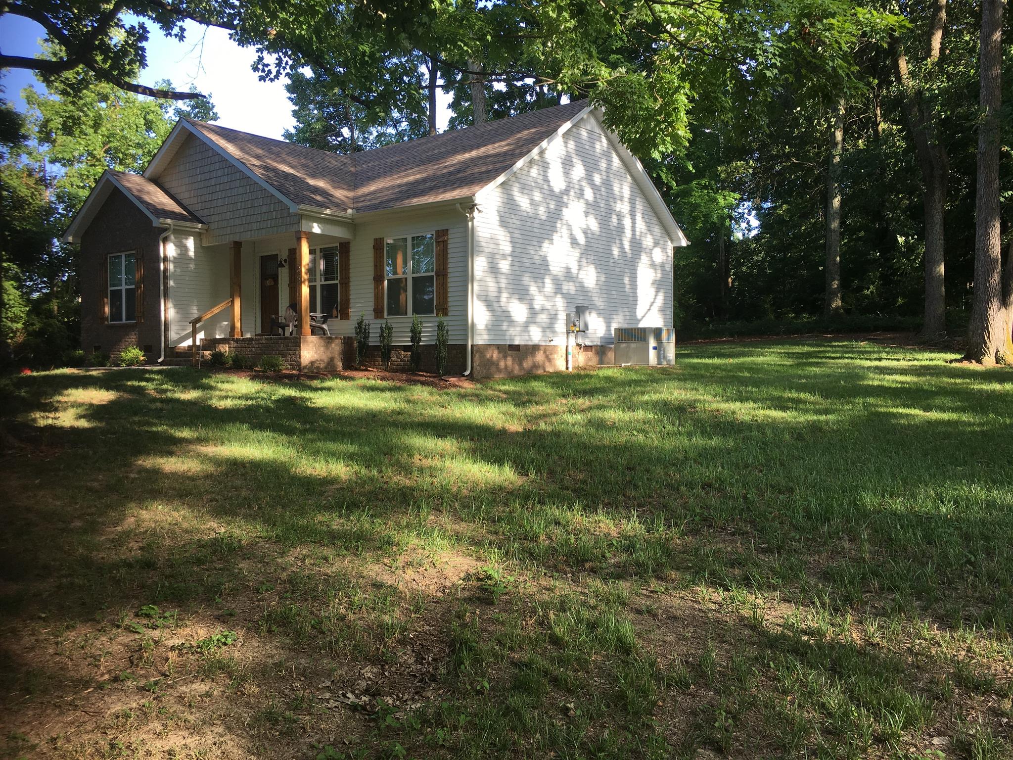 121 Point Road Portland, TN 37148 - Photo 5 of 23 a view of a house with a yard and sitting area