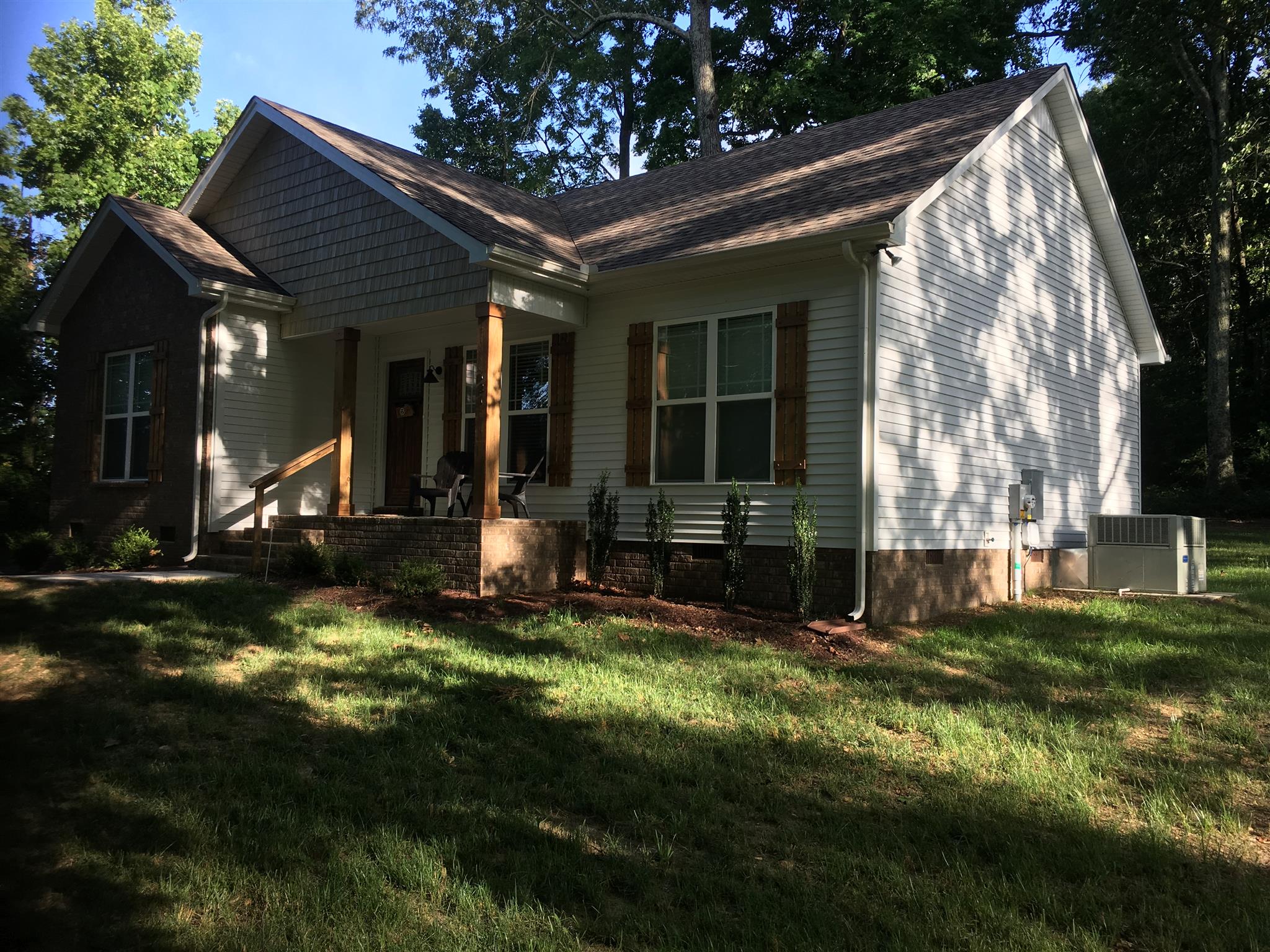 121 Point Road Portland, TN 37148 - Photo 6 of 23 a view of a house with backyard porch and sitting area