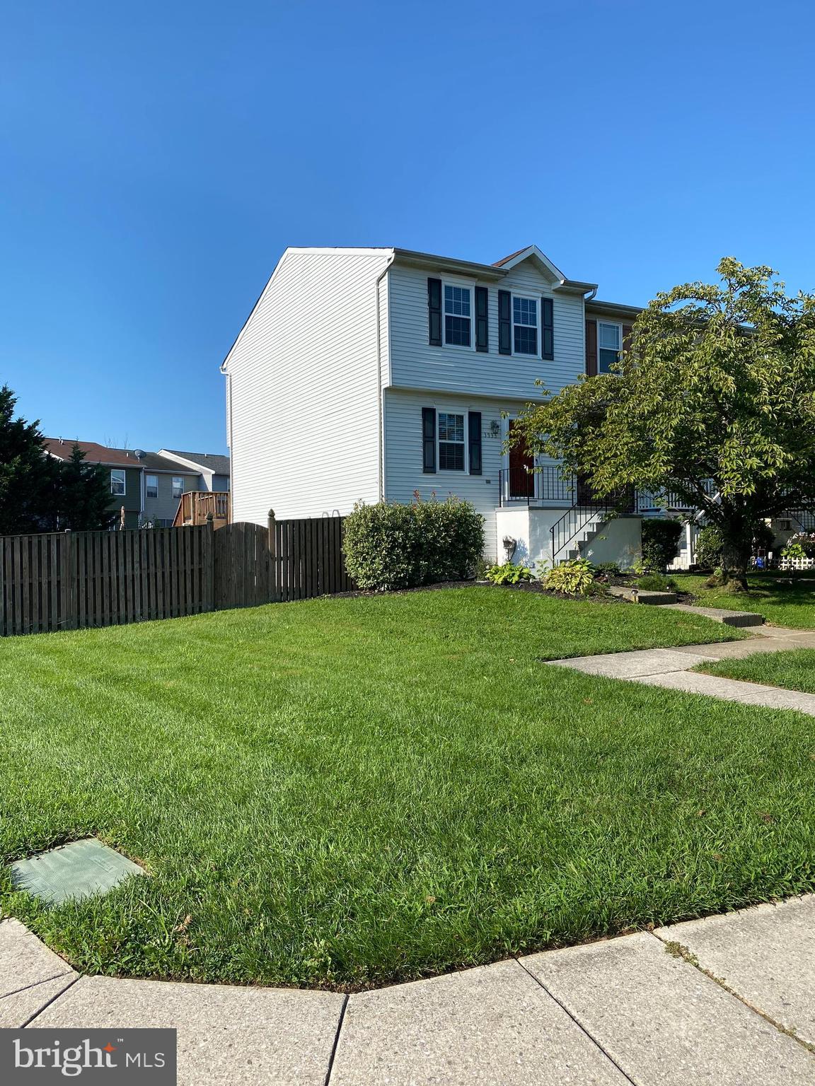 3933 Cutty Sark Road Baltimore, MD 21220 - Photo 1 of 69 a front view of a house with a yard