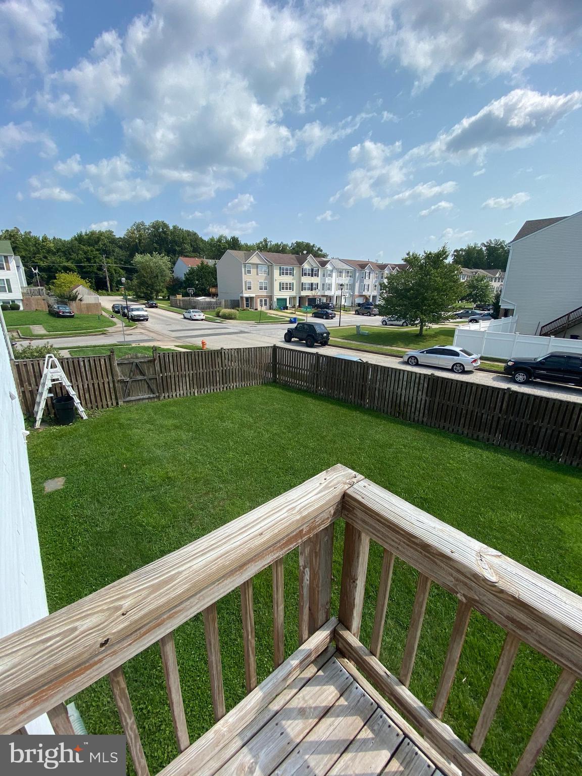 3933 Cutty Sark Road Baltimore, MD 21220 - Photo 12 of 69 a view of a yard with wooden fence