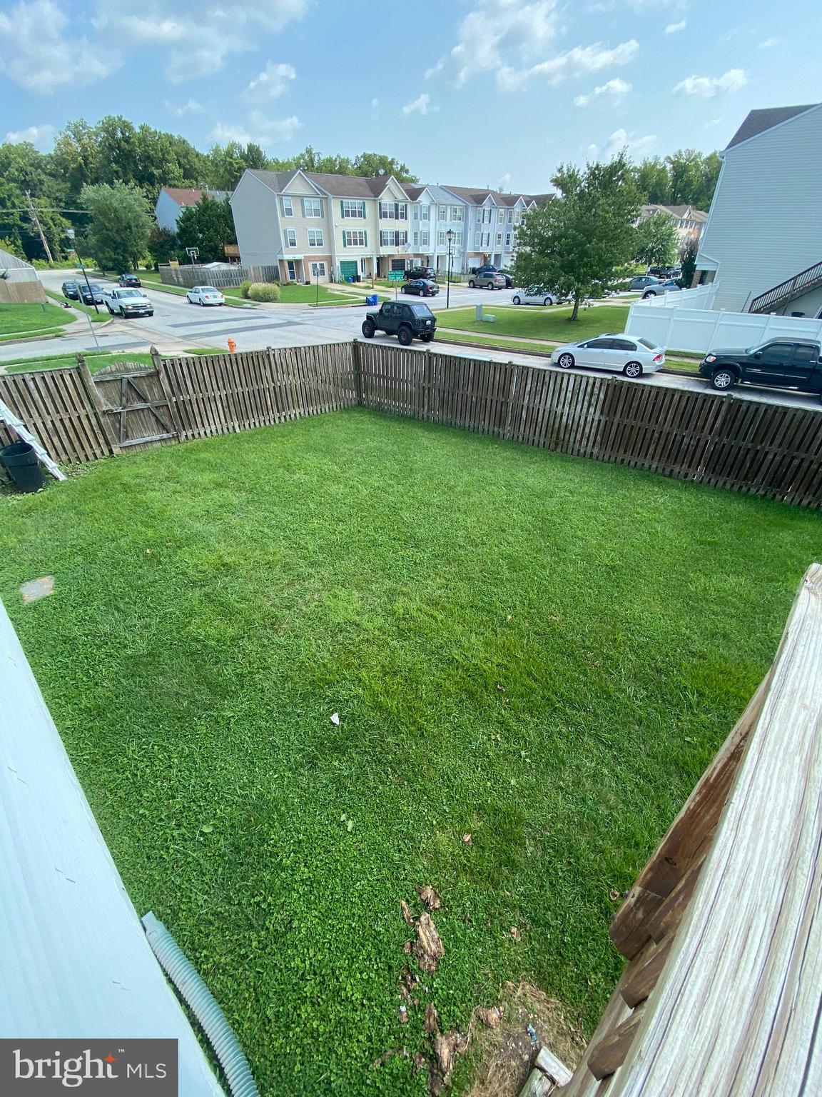 3933 Cutty Sark Road Baltimore, MD 21220 - Photo 17 of 69 a view of a terrace with a yard and fence
