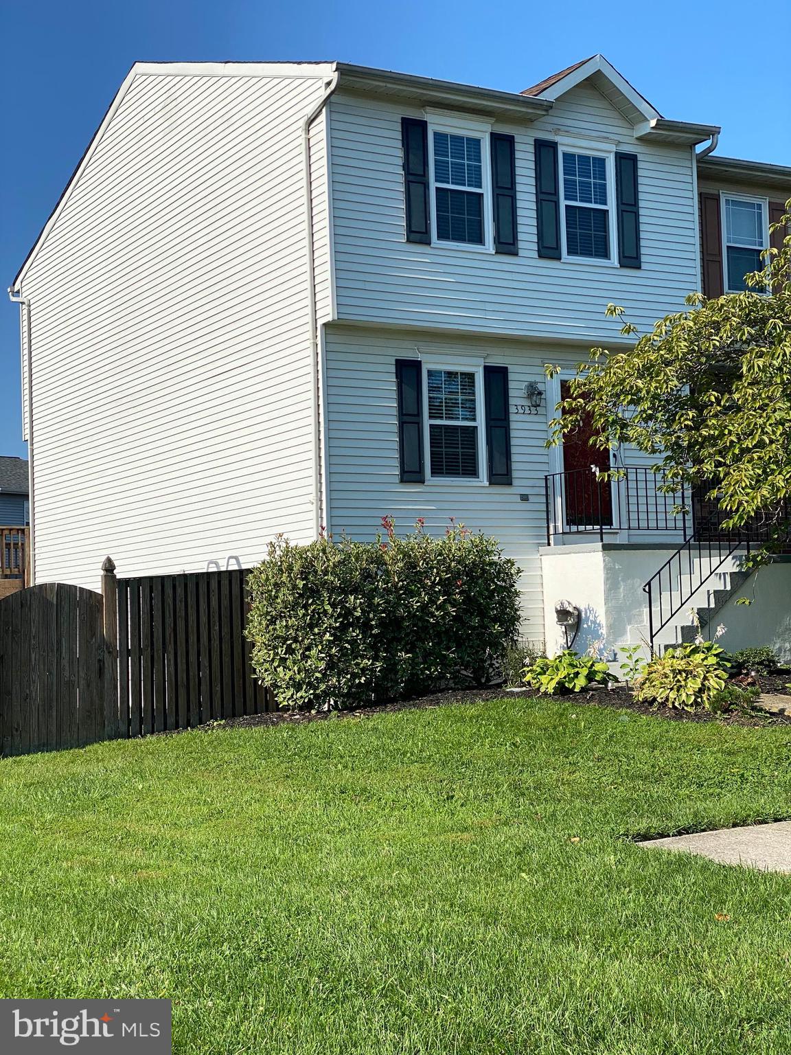 3933 Cutty Sark Road Baltimore, MD 21220 - Photo 3 of 69 a front view of a house with garden