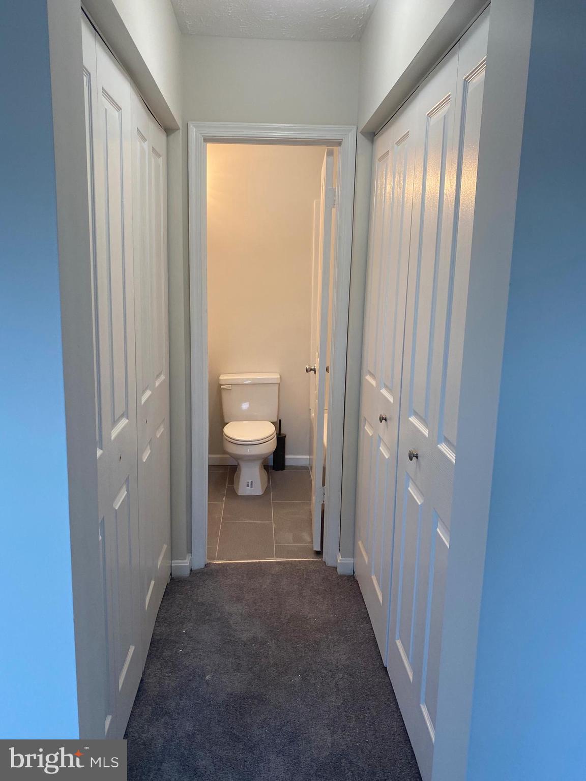 3933 Cutty Sark Road Baltimore, MD 21220 - Photo 50 of 69 a view of a bathroom from a hallway