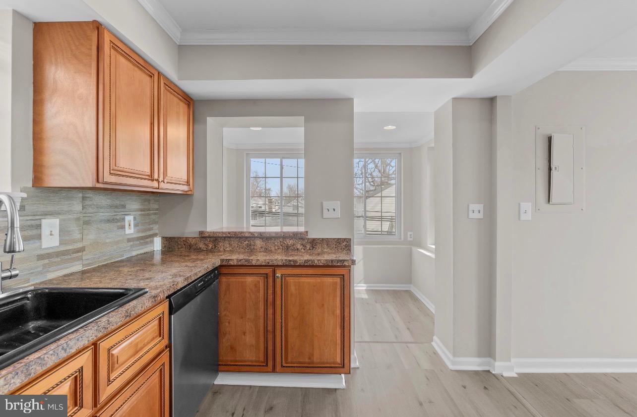 2528 Wendover Road, Unit A Baltimore, MD 21234 - Photo 7 of 18 Bright and inviting kitchen with modern finishes.