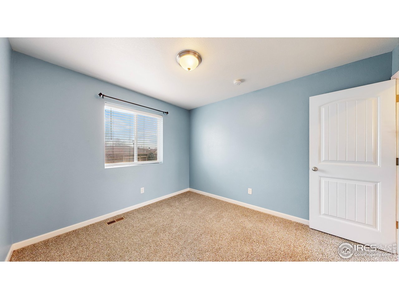 419 Clark Street Johnstown, CO 80534 - Photo 17 of 31 a open hall with a ceiling fan