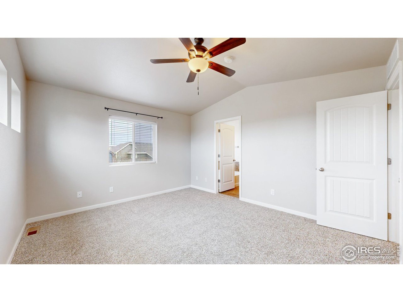 419 Clark Street Johnstown, CO 80534 - Photo 19 of 31 a living room with furniture and window