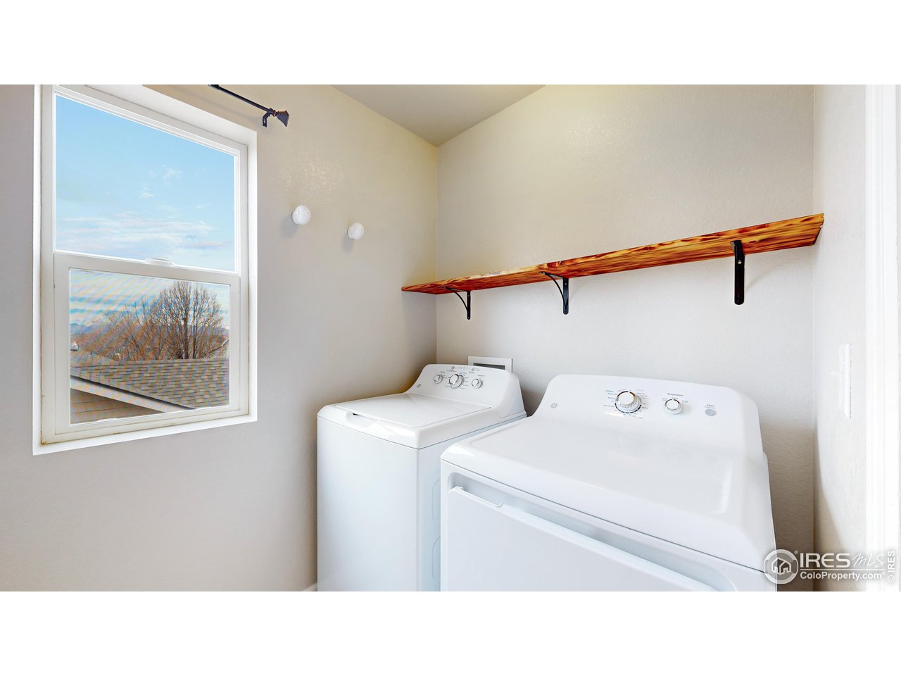 419 Clark Street Johnstown, CO 80534 - Photo 22 of 31 a utility room with dryer and washer