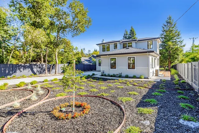 a front view of a house with swimming pool