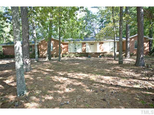 1000 Mulberry Road Clayton, NC 27520 - Photo 1 of 24 Wonderful all Brick Ranch home with over 3000sf on 2 lots in established neighborhood. This grand home was built in 1973 with no expense spared. Loads of closets, storage and living space make this a renovaters dream!!! Exterior Front
