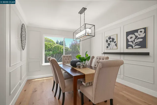 a spacious bedroom with a bed and a table in it