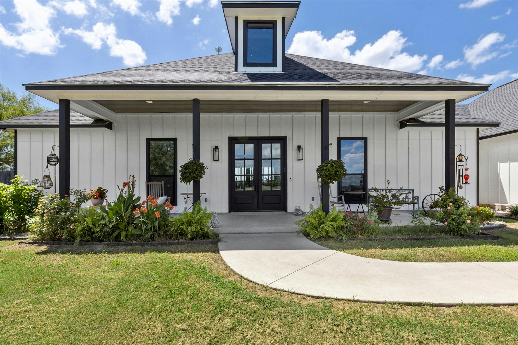 1170 Watterson Road Red Rock, TX 78662 - Photo 2 of 36 a view of a house with potted plants