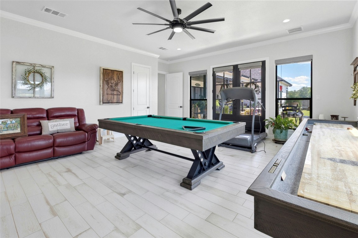 1170 Watterson Road Red Rock, TX 78662 - Photo 27 of 36 a living room with furniture and a table