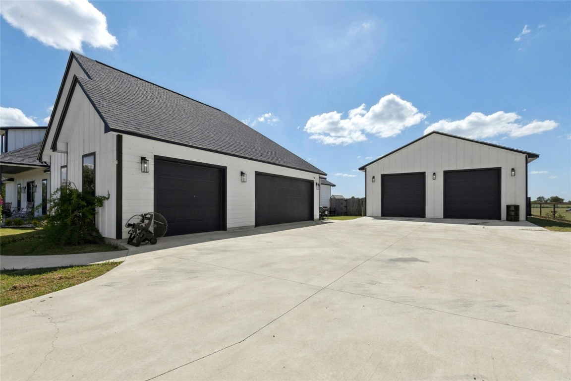 1170 Watterson Road Red Rock, TX 78662 - Photo 35 of 36 a view of a livingroom with a chandelier and entryway