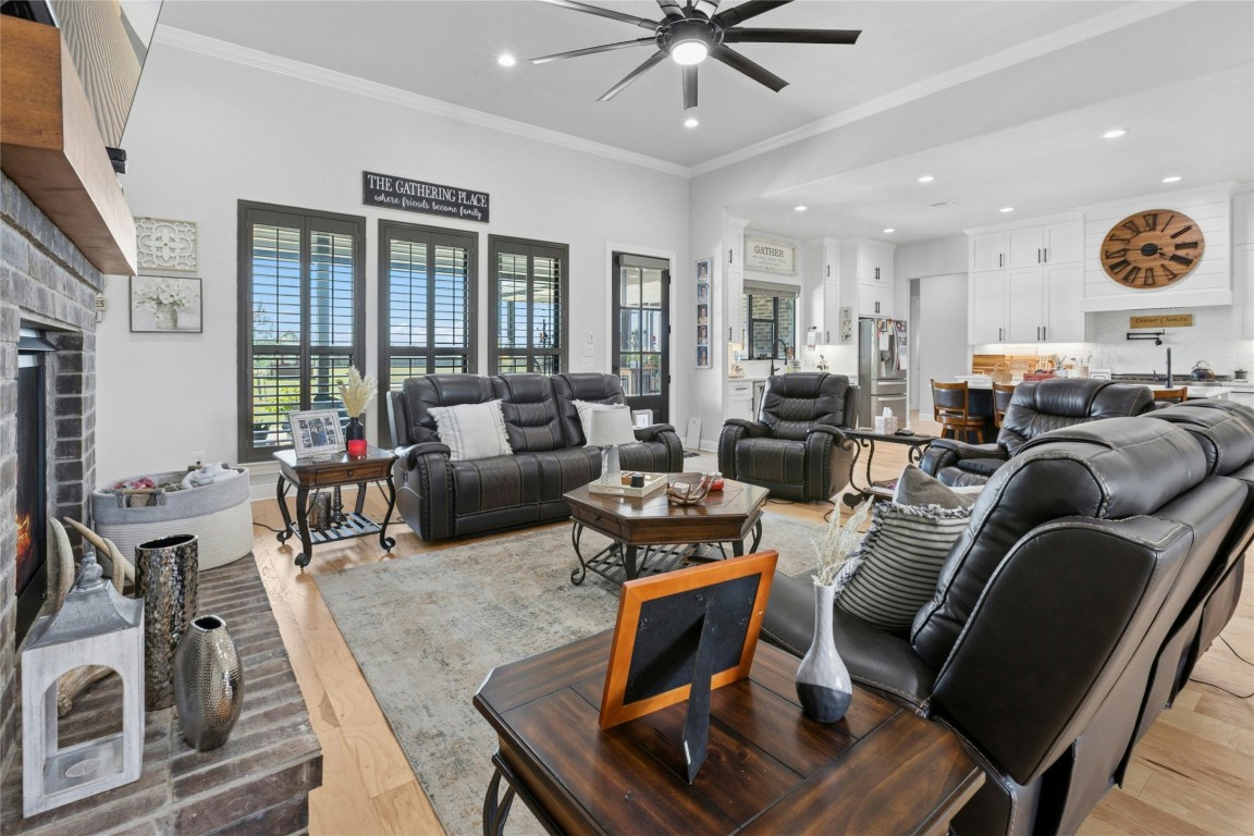 1170 Watterson Road Red Rock, TX 78662 - Photo 6 of 36 a living room with furniture kitchen view and a large window