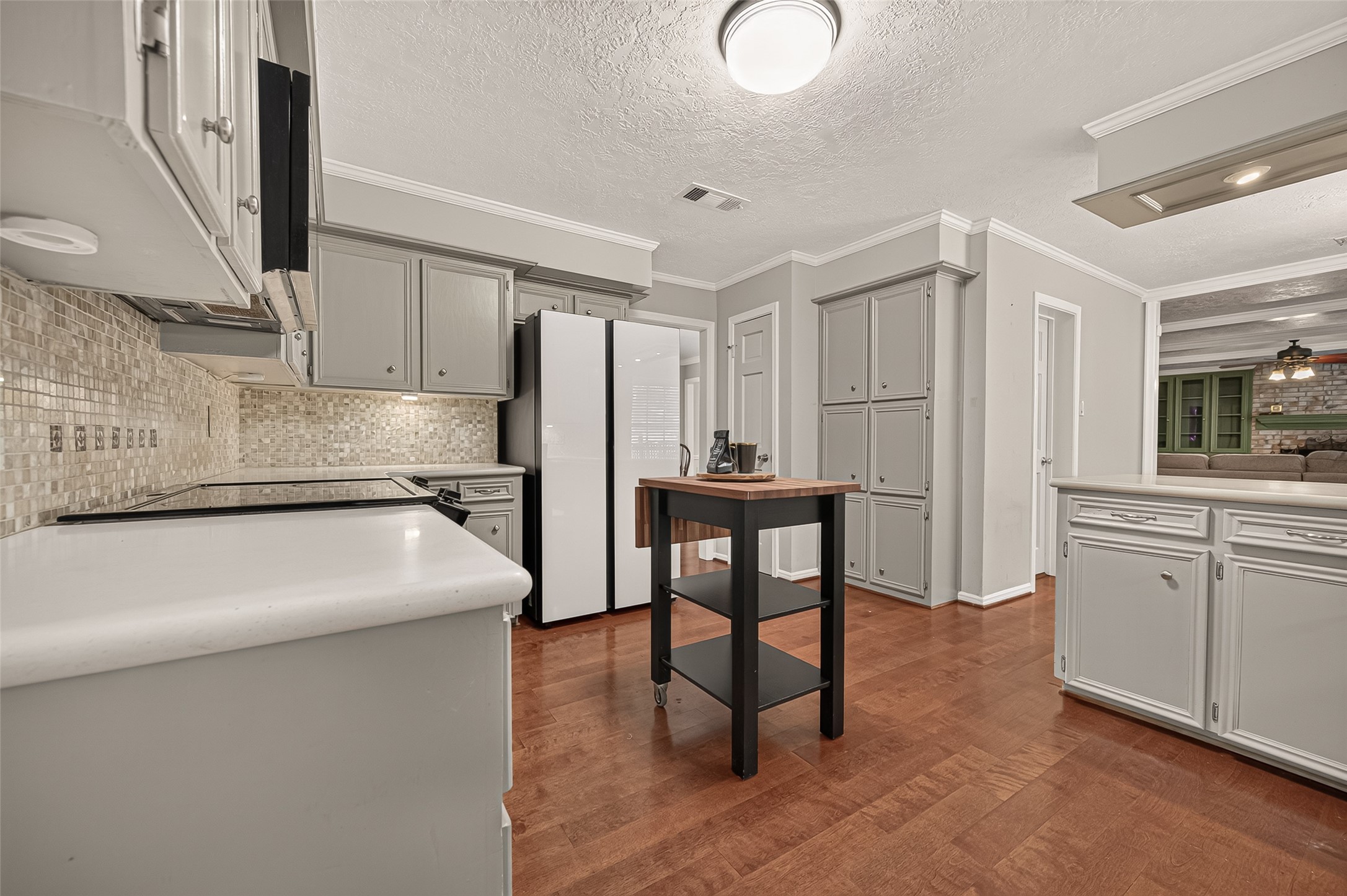 8007 Vickridge Lane Spring, TX 77379 - Photo 16 of 44 A spacious kitchen designed for everyday convenience, with extensive cabinetry, a large pantry, and an easy connection to the adjoining dining area