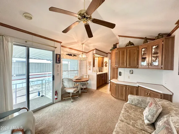 a living room with furniture and a window