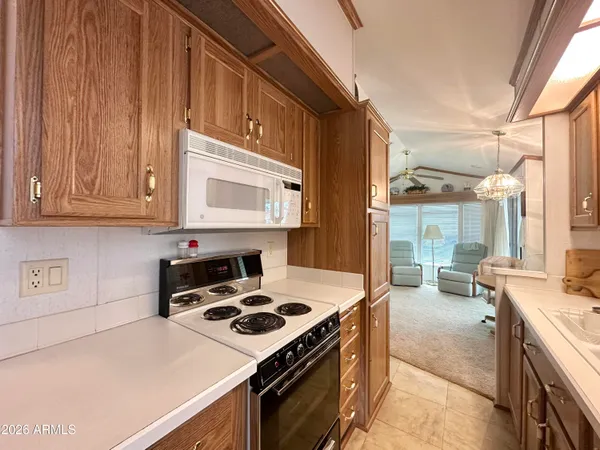 a kitchen with a stove and a sink