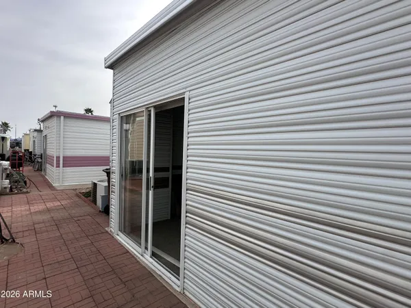a view of a house with a large window