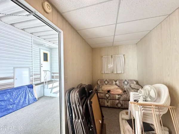 a bed room with furniture and a window