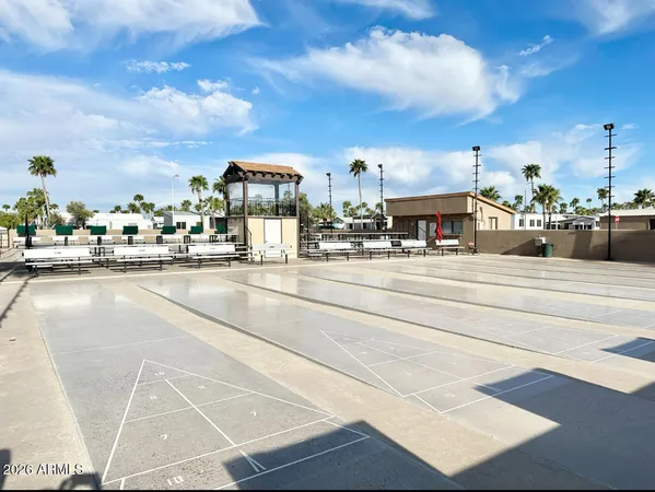 a view of swimming pool with outdoor seating