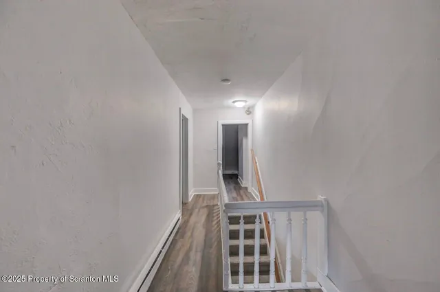 a kitchen with stainless steel appliances granite countertop a refrigerator sink and stove