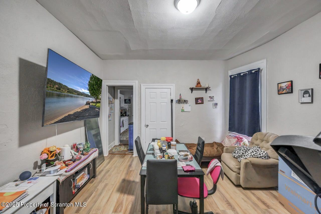 516 Harrison Avenue Scranton, PA 18510 - Photo 28 of 74 a living room with furniture and a flat screen tv