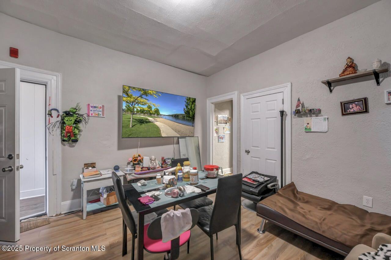 516 Harrison Avenue Scranton, PA 18510 - Photo 30 of 74 a living room with furniture and a flat screen tv