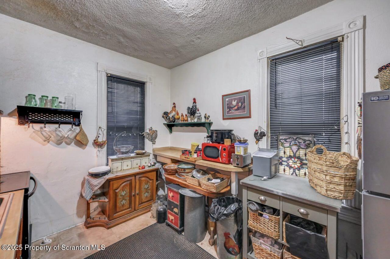 516 Harrison Avenue Scranton, PA 18510 - Photo 44 of 74 a living room with furniture and a flat screen tv