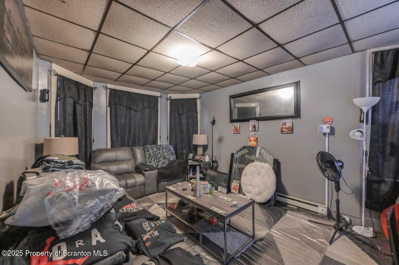 516 Harrison Avenue Scranton, PA 18510 - Photo 56 of 74 a living room with furniture and a flat screen tv