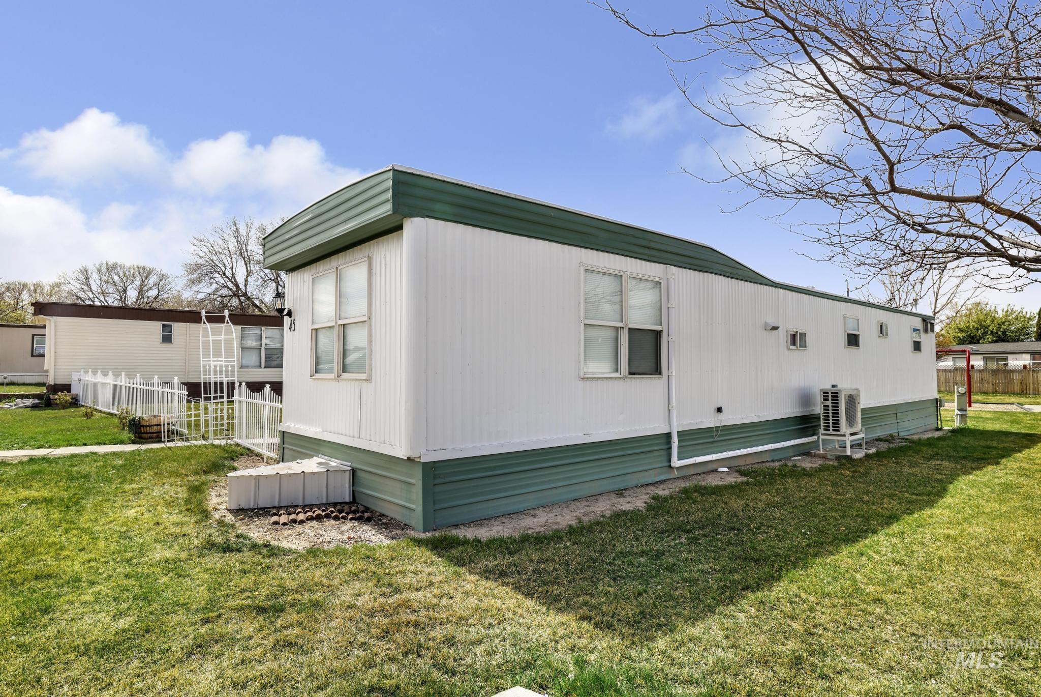 198 South Hills Road, Unit 45 Twin Falls, ID 83301 - Photo 4 of 25 View of home's exterior featuring an ac unit