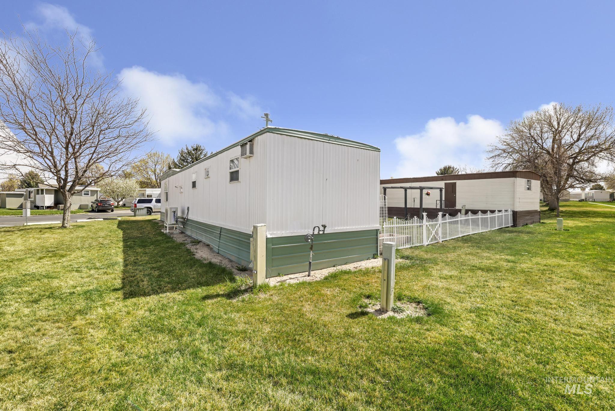 198 South Hills Road, Unit 45 Twin Falls, ID 83301 - Photo 5 of 25 View of home's exterior with an ac unit