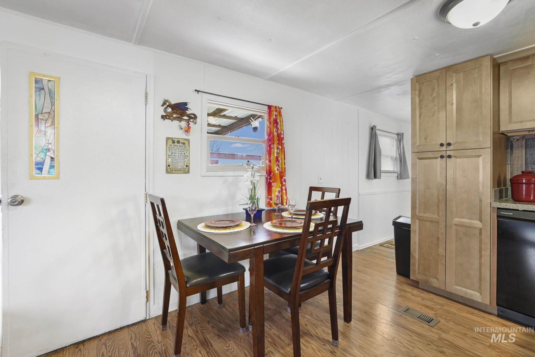 198 South Hills Road, Unit 45 Twin Falls, ID 83301 - Photo 10 of 25 Dining room with light wood finished floors