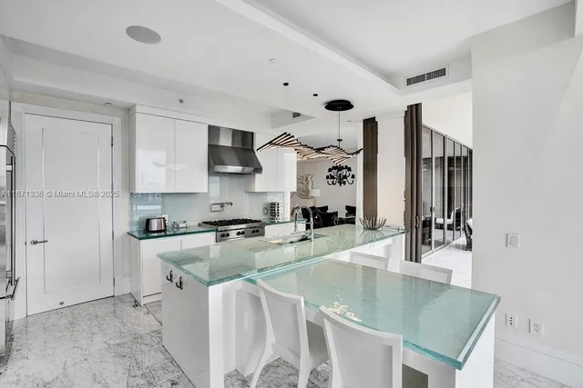 a bath room with a bed and furniture