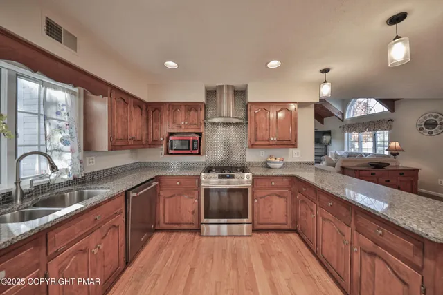 a bed room with a bed and a chandelier