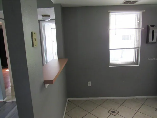 an entryway door with a window