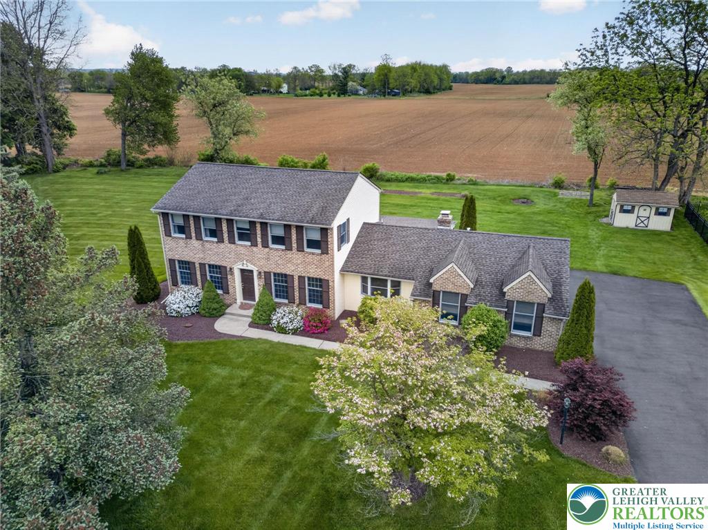 7098 Limerick Square Bath, PA 18014 - Photo 1 of 31 an aerial view of house with yard and lake view