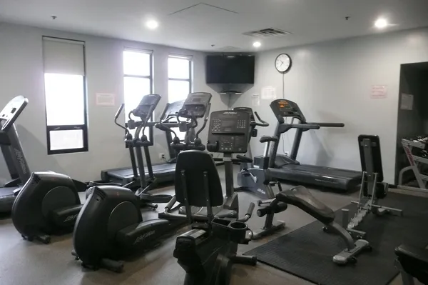 a view of a chairs and table in a room