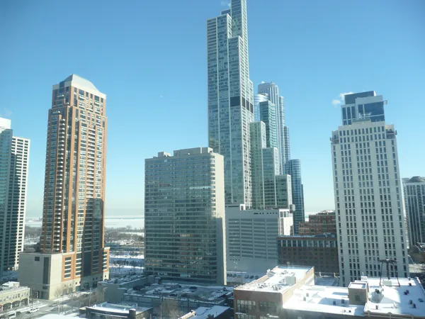 a view of a city with tall buildings