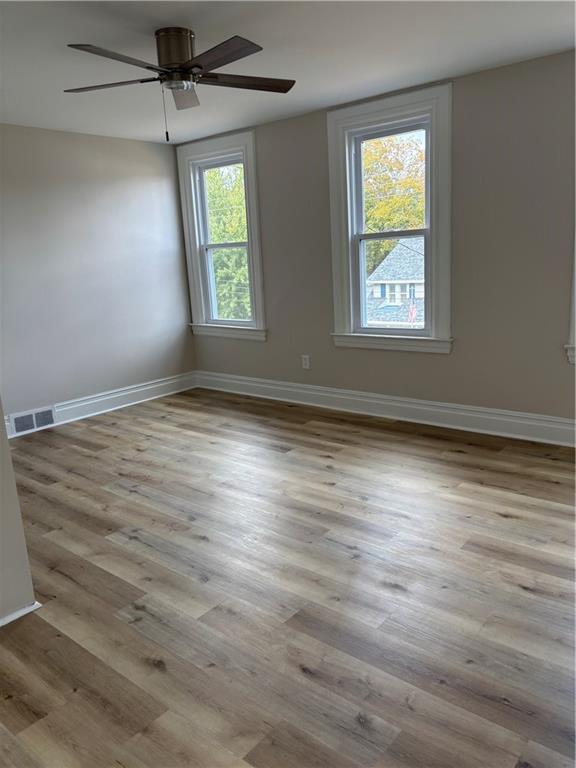 1216 Vance Avenue Coraopolis, PA 15108 - Photo 14 of 19 wooden floor in an empty room with a window