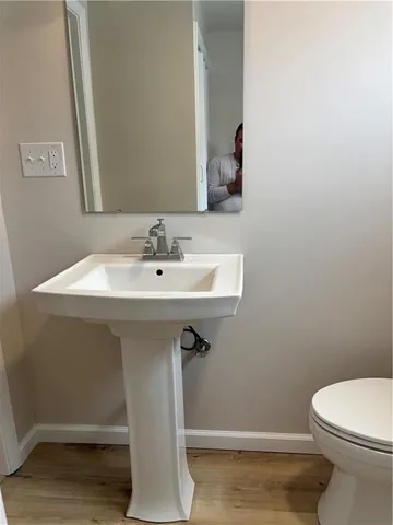 a bathroom with a sink and a toilet