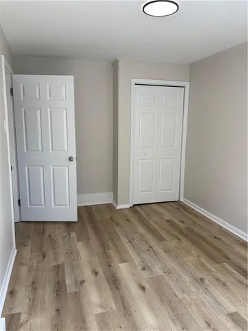 a view of room with hardwood floor