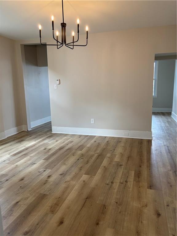 1216 Vance Avenue Coraopolis, PA 15108 - Photo 4 of 19 a view of a room with wooden floor