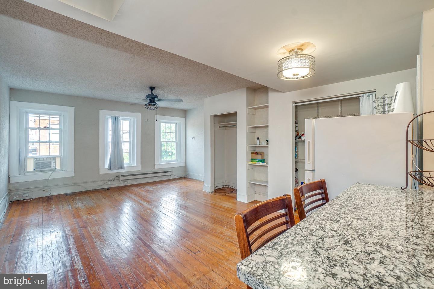 1420 Light Street, Unit 3F Baltimore, MD 21230 - Photo 2 of 8 a view of livingroom with furniture and wooden floor