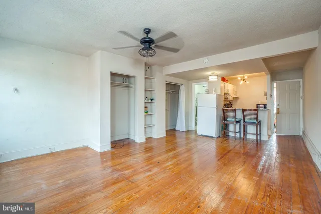 a view of an empty room and window