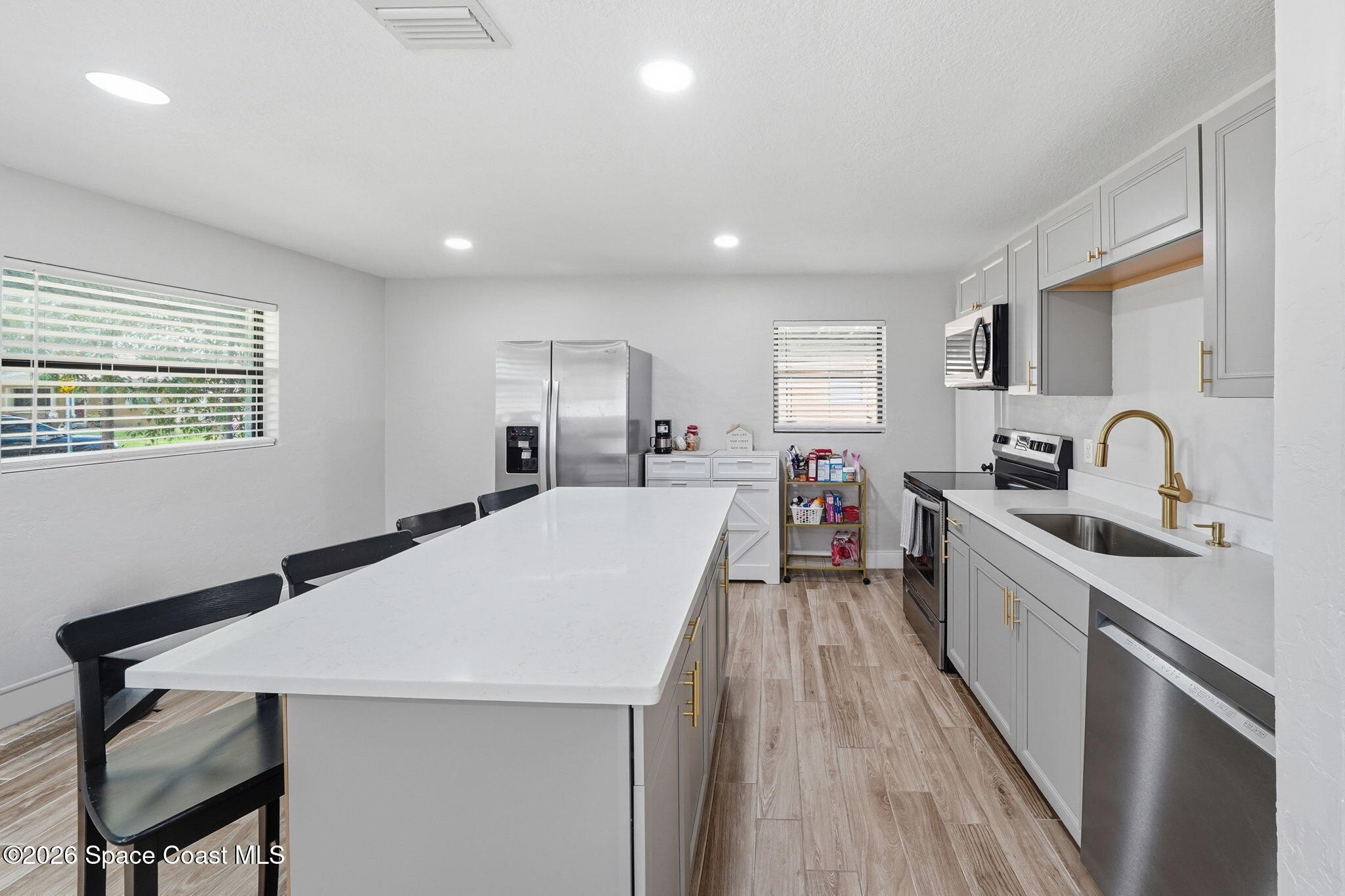 2440 Warwick Road Melbourne, FL 32935 - Photo 10 of 31 kitchen with island