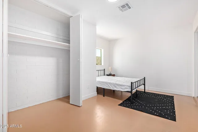 a view of workspace room with wooden floor