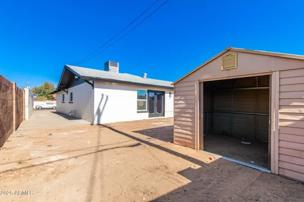 a view of a house with a garage