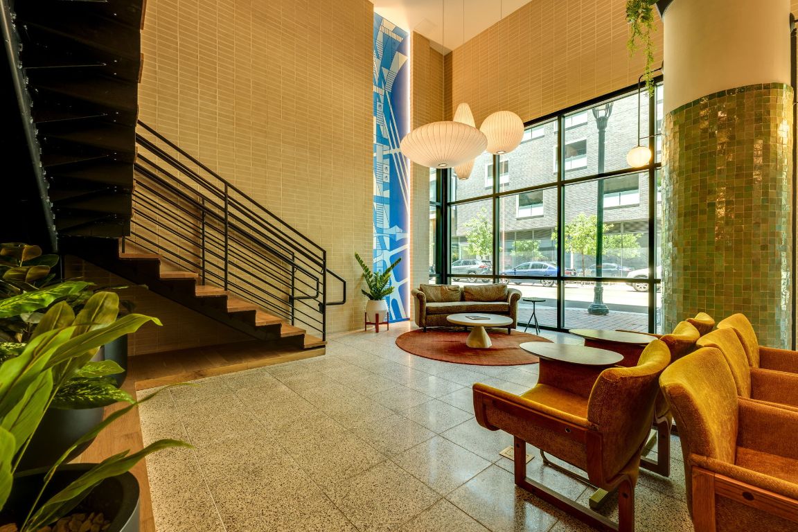 1701 Simond Avenue, Unit 524 Austin, TX 78723 - Photo 29 of 30 Lobby stairs that lead up to work tables and conference room