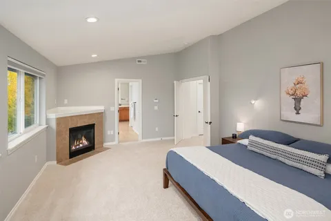 a view of a patio with couches chairs and a fire pit