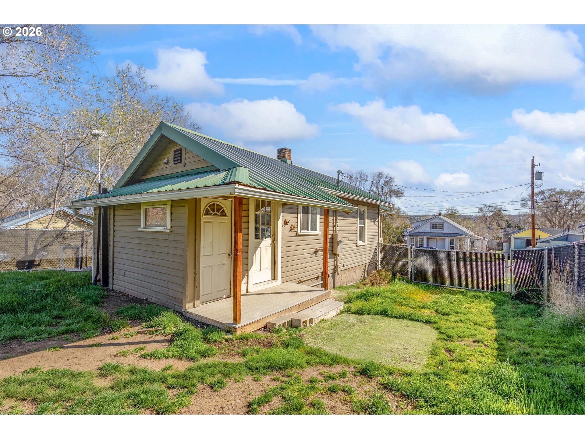 342 Southeast 7th Street Madras, OR 97741 - Photo 15 of 22 a view of a house with a yard